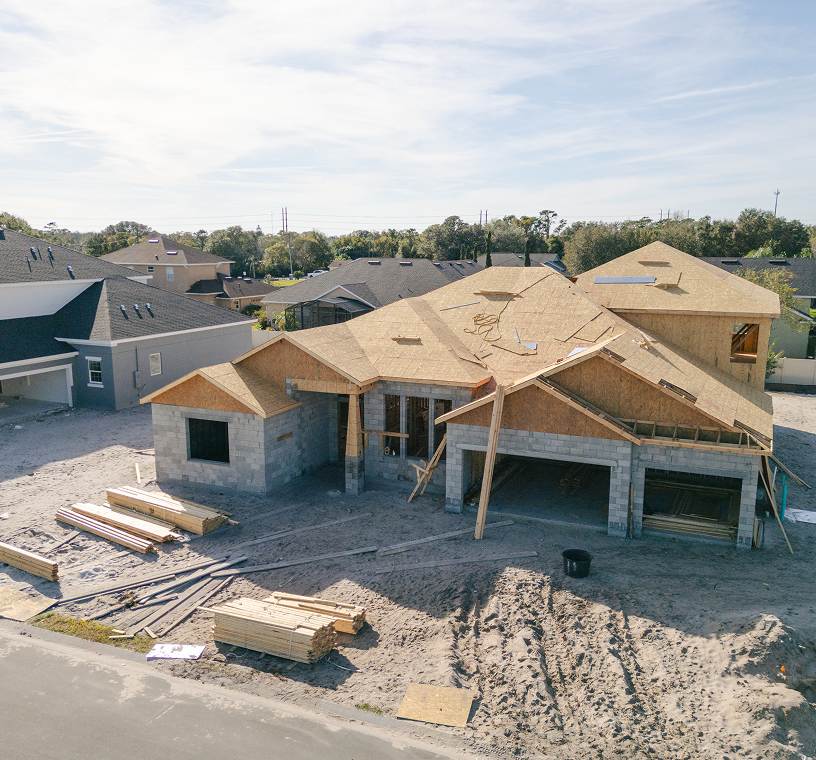 House under construction with wooden framework