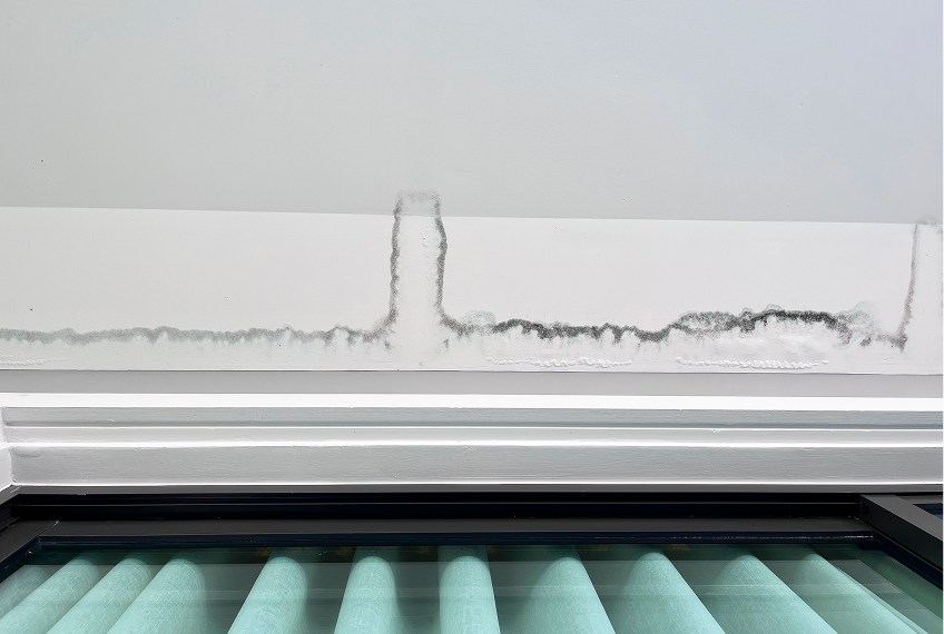 Damp wall above window frame