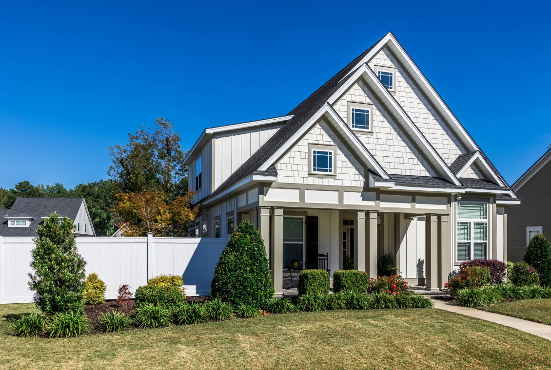 Two-story home with triangular roof design